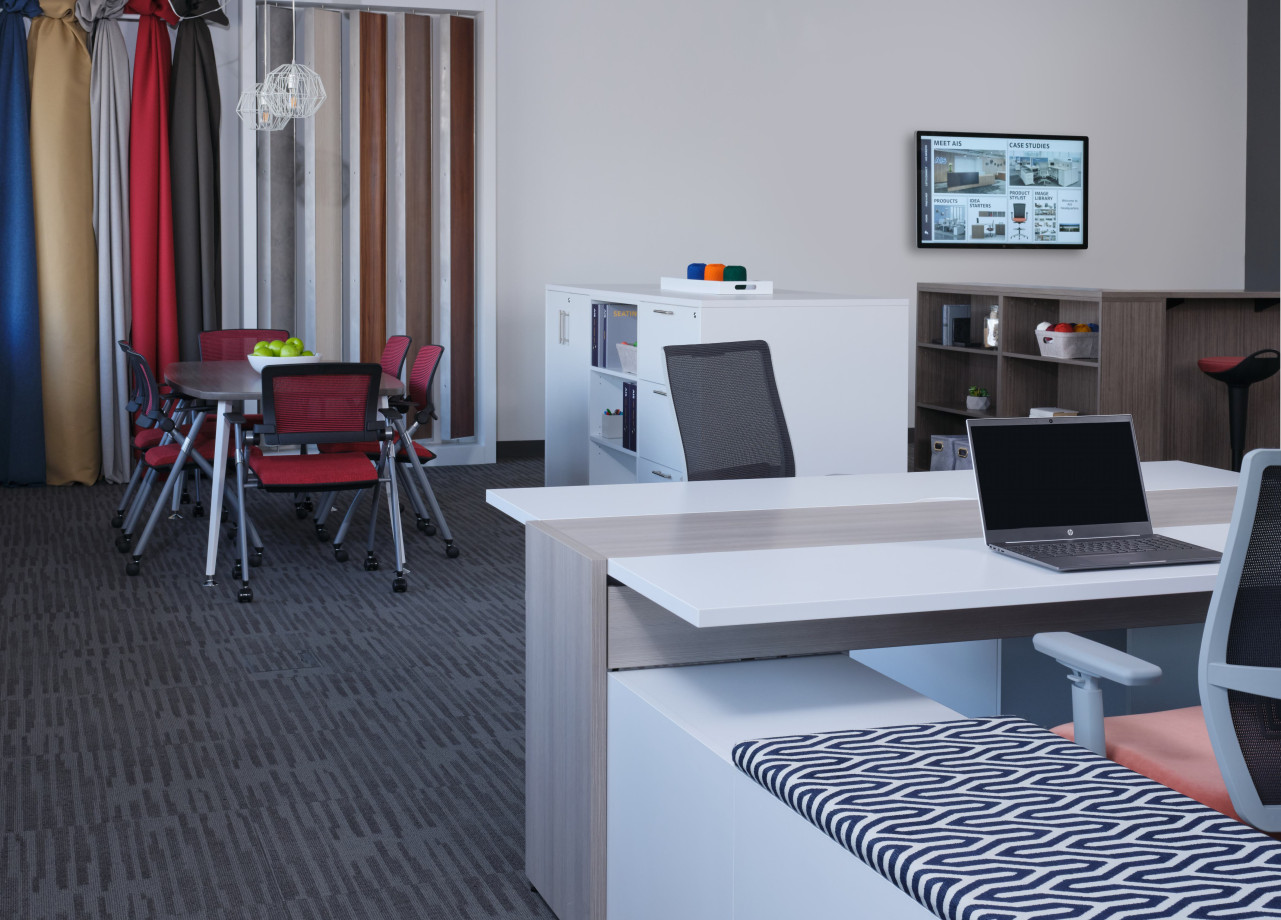 Preview of AIS Headquarter Showroom Finish Center with Day-to-Day Table surrounded by Stow Seating and Calibrate Storage