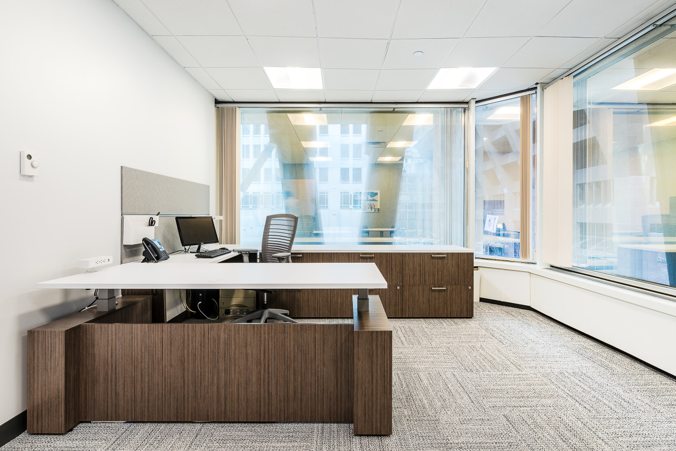 Preview of Client Space with Calibrate Series Casegoods Height Adjustable Desk and Natick Seating