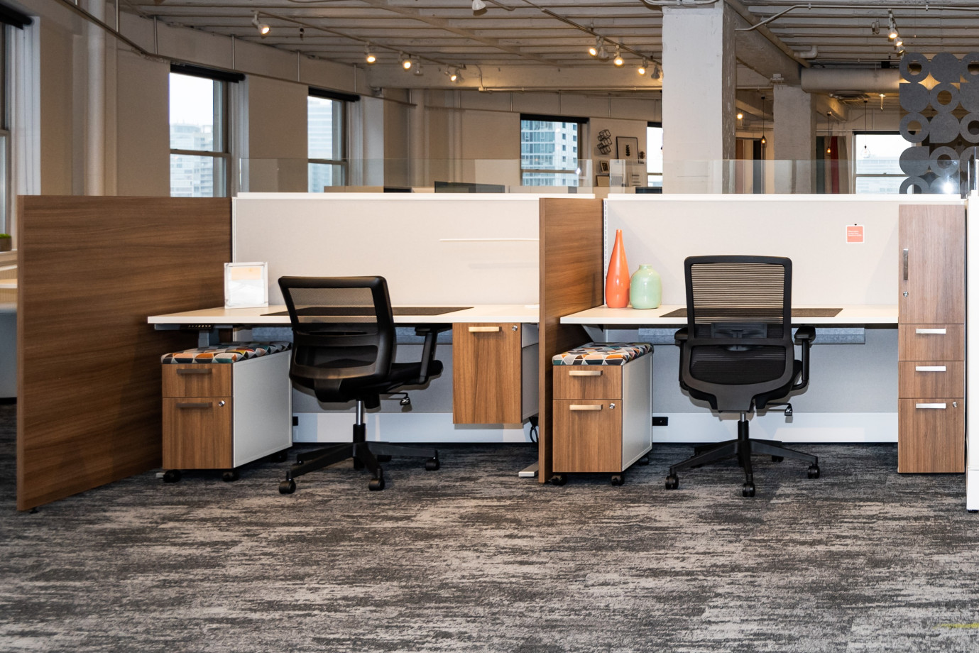 Preview of NeoCon 2021 Divi Linear with Gallery Panels and Calibrate Storage, including hanging pedestal storage. Shown with Essex and Revere seating.