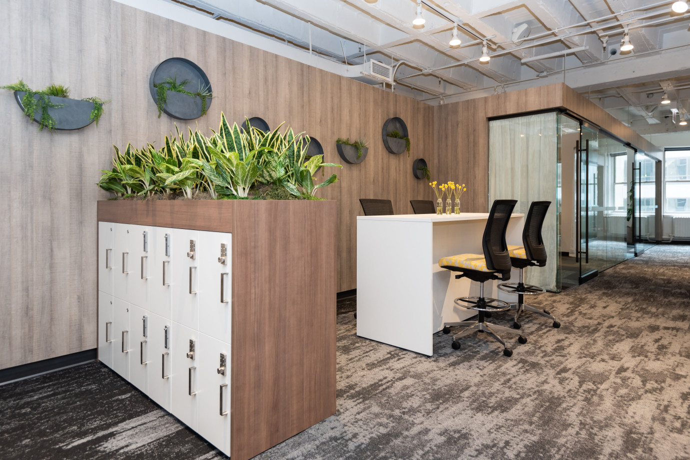 Preview of NeoCon 2021 Calibrate Lockers with Dry Planter Wrap  and Calibrate End Panel Table with Upton Stools