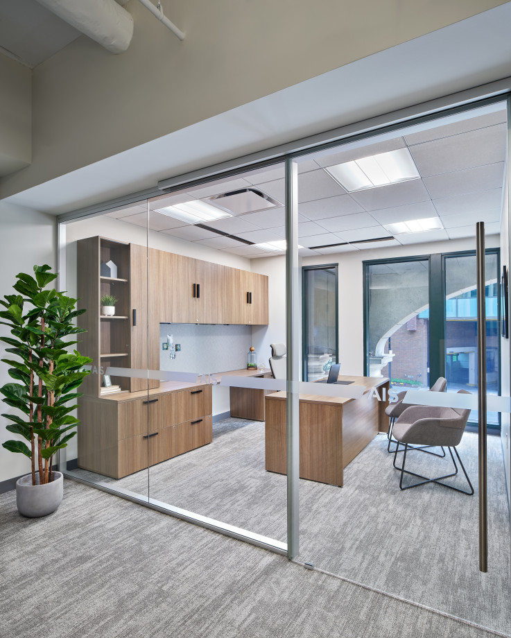 Preview of Washington DC Showroom Executive Private Office with Calibrate Casegoods in u-shape configuration.&nbsp; Shown with Natick executive chair with headrest