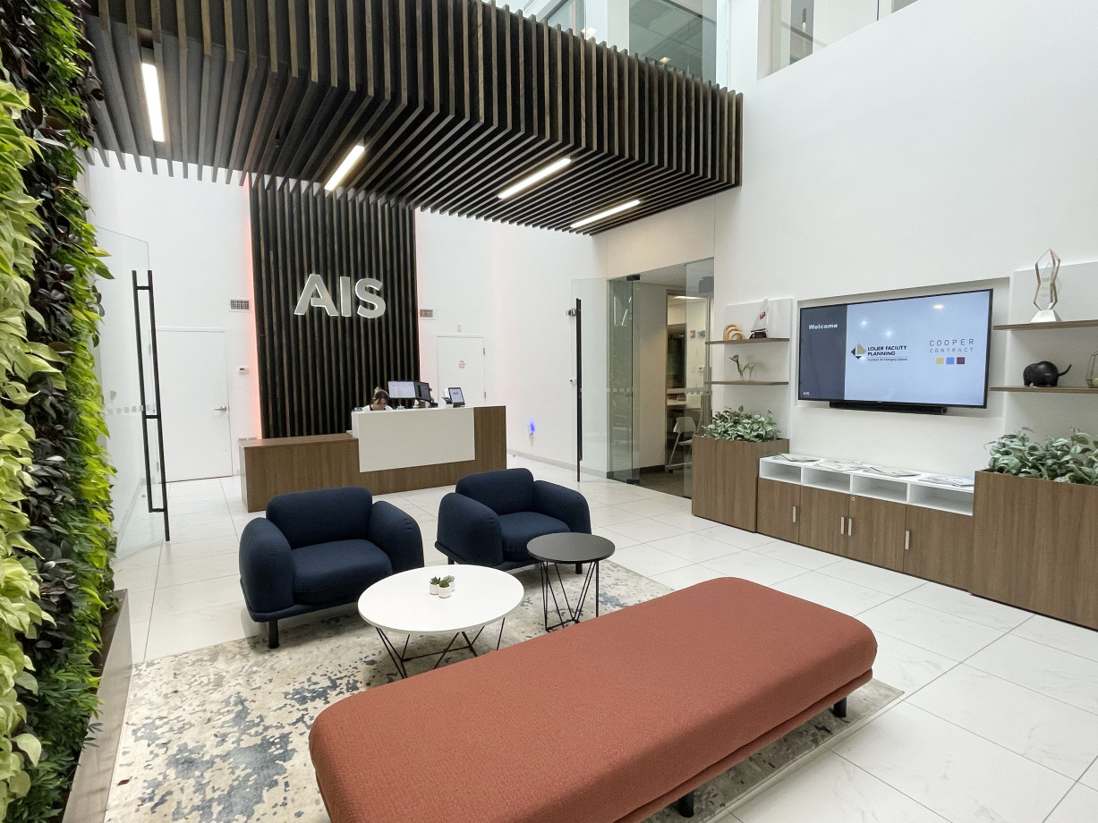 Preview of AIS Headquarters Lobby featuring Calibrate Reception and Storage and Soft Lounge Seating