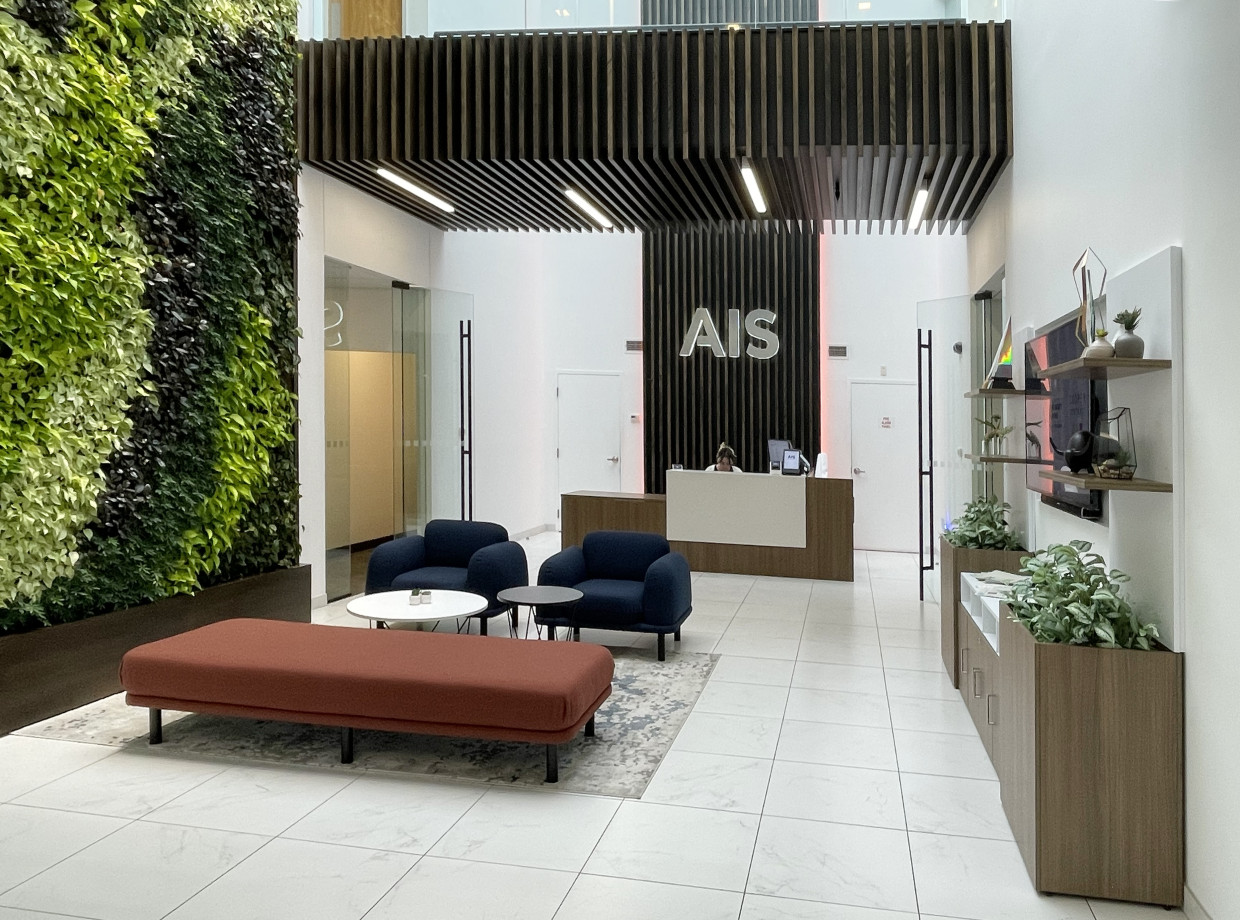 Preview of AIS Headquarters Lobby with Calibrate Reception and Soft Lounge Seating