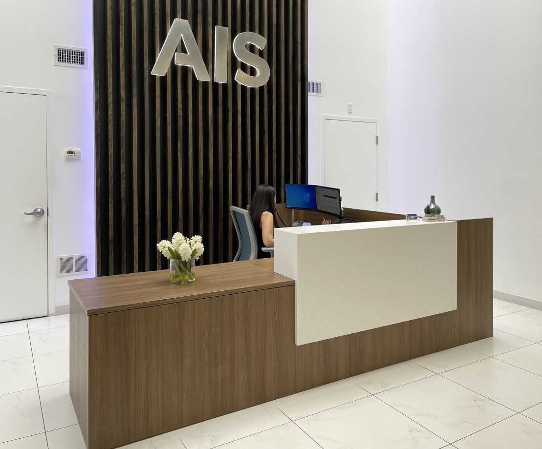Preview of AIS Headquarters Calibrate Reception Desk with Corian Stack-on