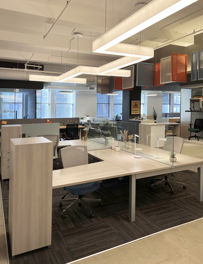 Preview of New York Showroom 2023 Oxygen Benching with upmount glass screens, Natick task seating, and Calibrate Series Storage