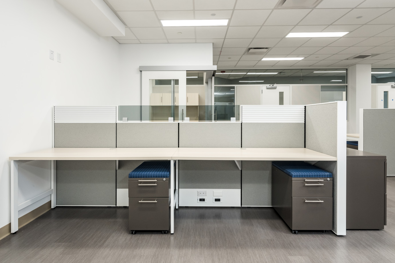 Preview of Matrix Workstations with Upmounted Grey Tint Glass, Tool Rail Inserts and L Series Pedestals Client Space