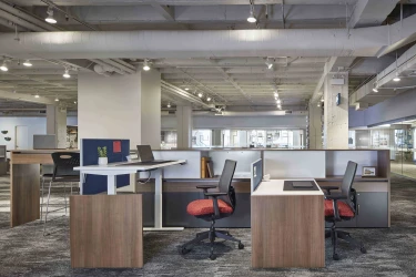 Calibrate Community with Height Adjustable Tables and Standing Height Spine