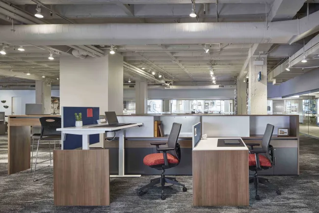 Calibrate Community with Height Adjustable Tables and Standing Height Spine