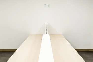 Top view of Matrix Workstation with wood laminate worksurfaces client space