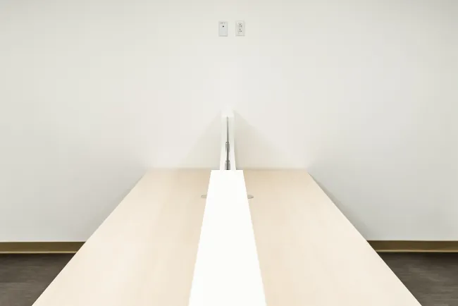 Top view of Matrix Workstation with wood laminate worksurfaces client space