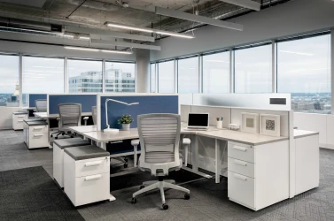 Client Space with Matrix, Height Adjustable Worksurfaces and Privacy Screens, L Series Storage and Natick Seating