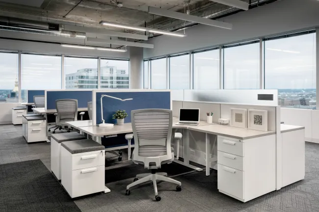 Client Space with Matrix, Height Adjustable Worksurfaces and Privacy Screens, L Series Storage and Natick Seating
