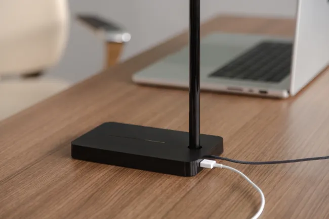 Talia desk lighting with USB cord plugged in